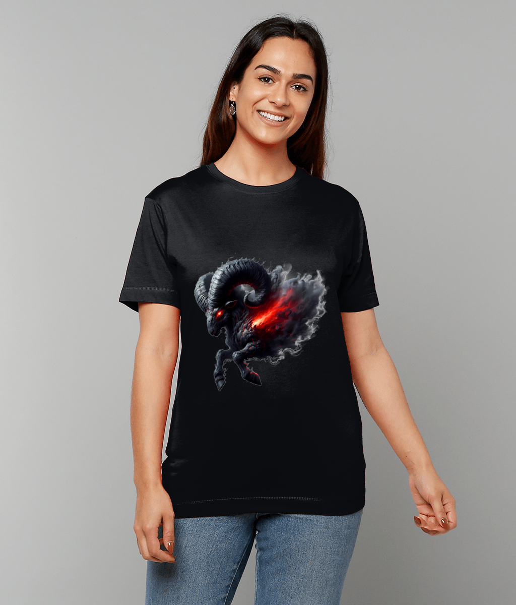 Spectral ram charges, its curved horns and glowing red core erupting from a smoky black t-shirt worn by a smiling woman standing against a plain gray background in jeans.