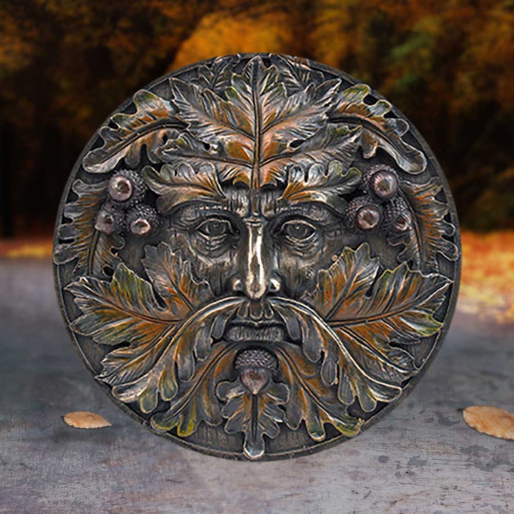 Autumn Equinox oak-leaf tree spirit plaque in an autumn woodland-style display
