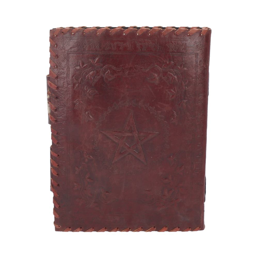 A dark red leather journal is closed, featuring a raised pentagram and vine design on its front cover, while its edges are bound with a stitched leather cord against a white background.