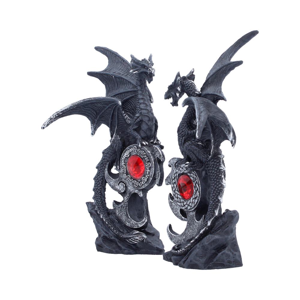 Angled view of the two black dragons showing wings and red centres