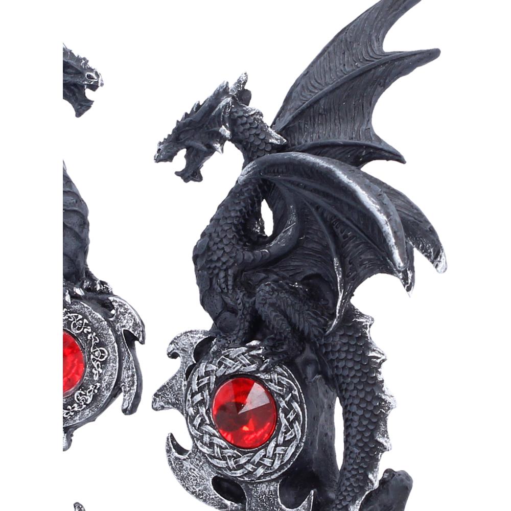 Close view of one Midnight Protector’s red detail with part of the second dragon visible