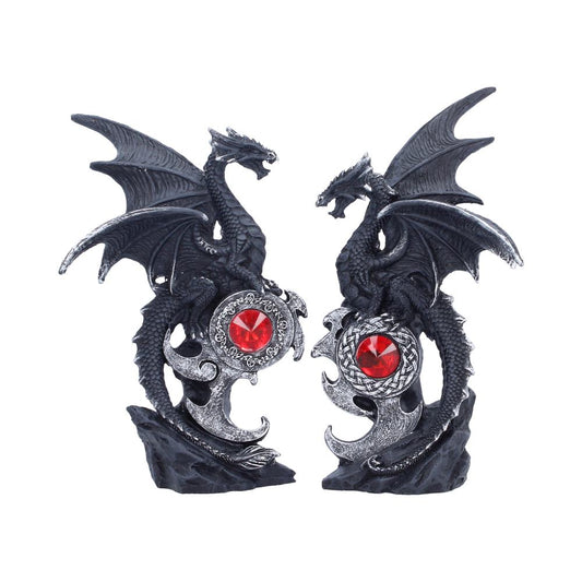 Midnight Protectors pair of black dragons facing inward above red jewel-like details
