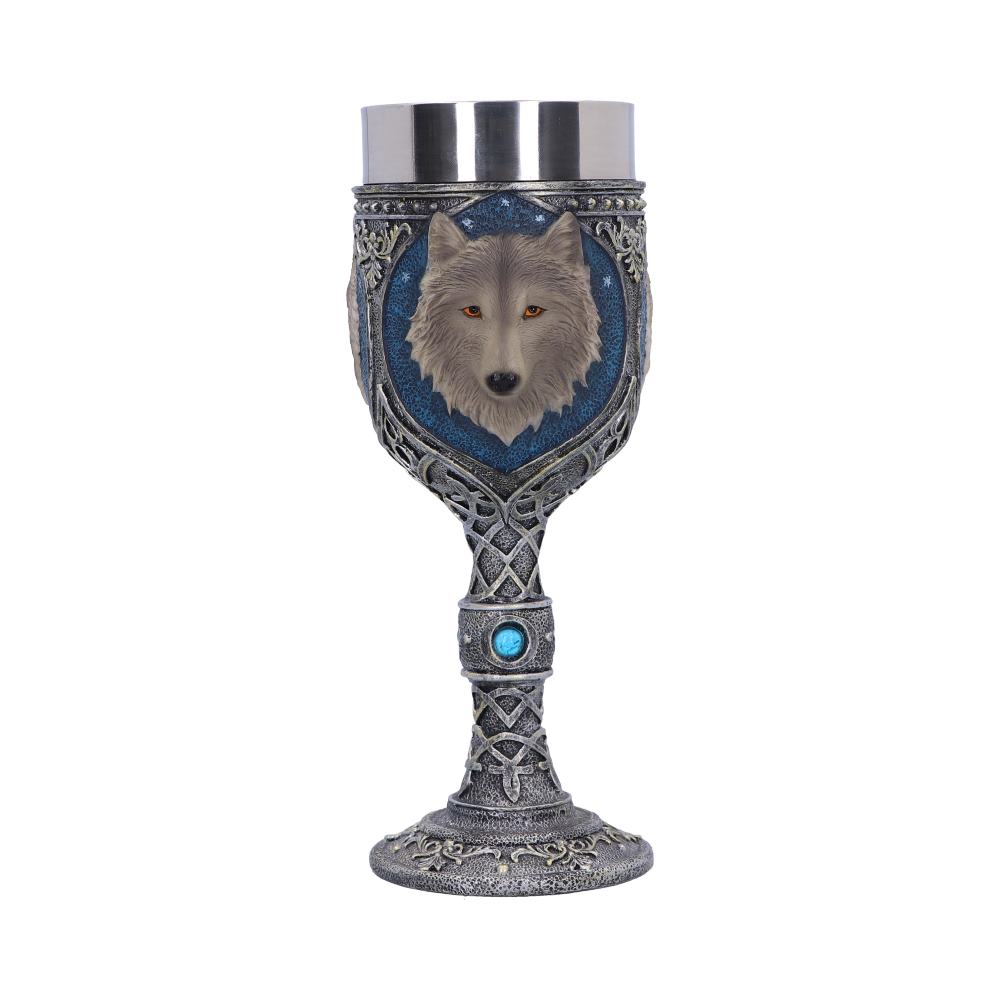 An ornate goblet features a silver-colored wolf head on a blue shield. Its stem has a large turquoise jewel and Celtic knot designs. It is against a white background.