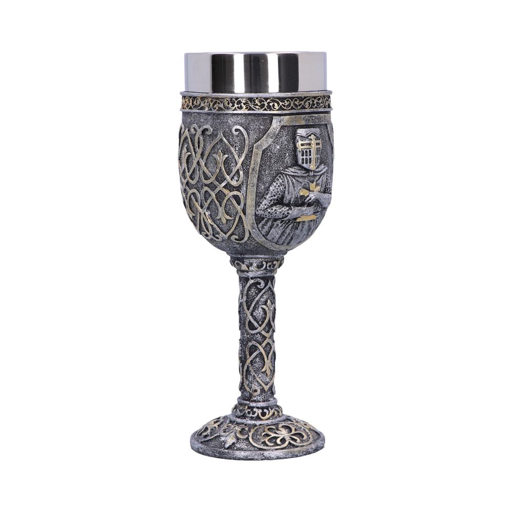 A decorative silver chalice with a steel interior is displayed. It features a knight, Celtic knots, and floral designs around its surface against a white background.
