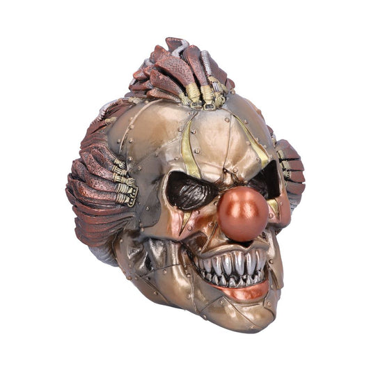 A metallic clown skull mask with sharp teeth and a red nose, adorned with cables and gears, rests against a plain white background, showcasing an industrial horror aesthetic.