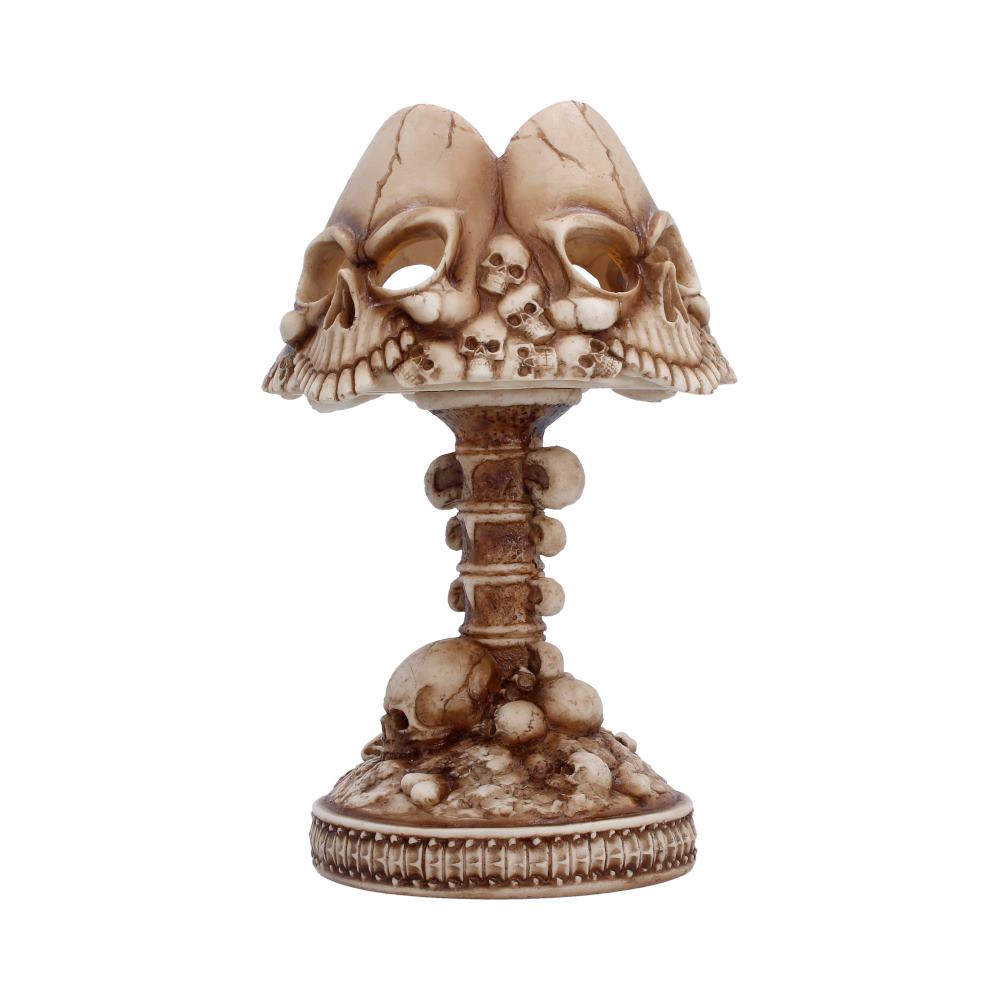 Last Light Bone Skull Lamp - angled pale skulls above bone-covered base