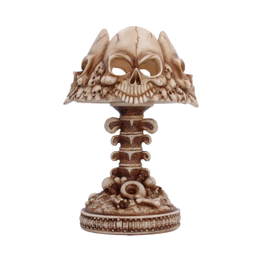 Last Light Bone Skull Lamp - side showing hollow sockets and warm brown shading