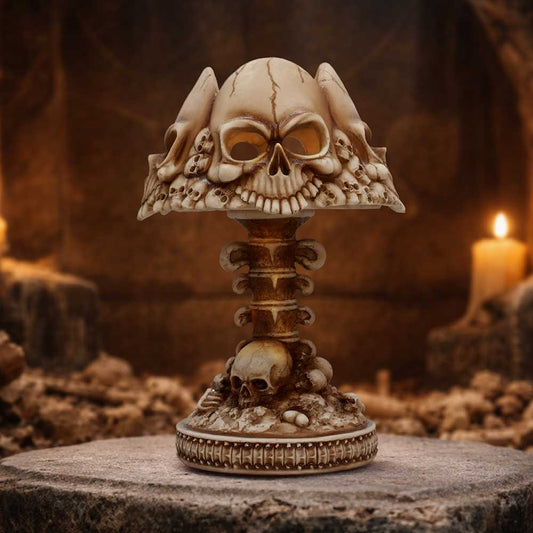 Last Light Bone Skull Lamp - bone-coloured skull lamp on a gothic display
