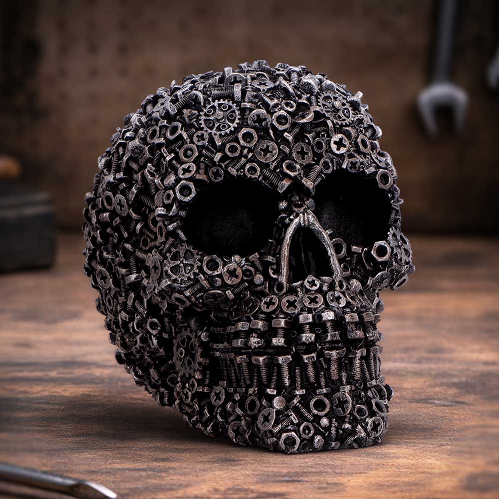 Screwed Industrial Skull Ornament - industrial skull in a dark workshop setting