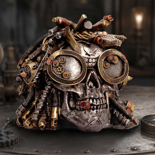 Deadlocked Steampunk Skull Ornament - goggled skull displayed in a dark industrial setting