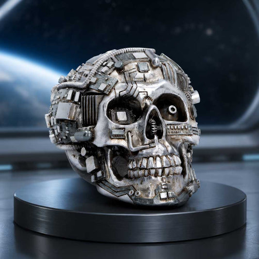 Technomortis Microchip Skull Ornament - futuristic skull displayed on a dark plinth against a space-themed backdrop