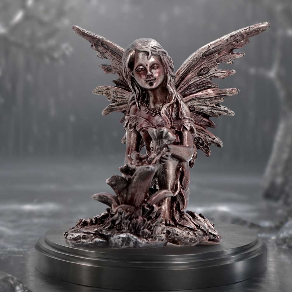 Enchanted Forest Flora Fairy Figurine - fairy displayed on a woodland pedestal