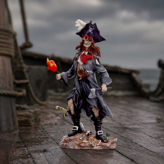 Cursed Captain Skeleton Pirate Figurine - torch-bearing skeleton pirate in a nautical display setting