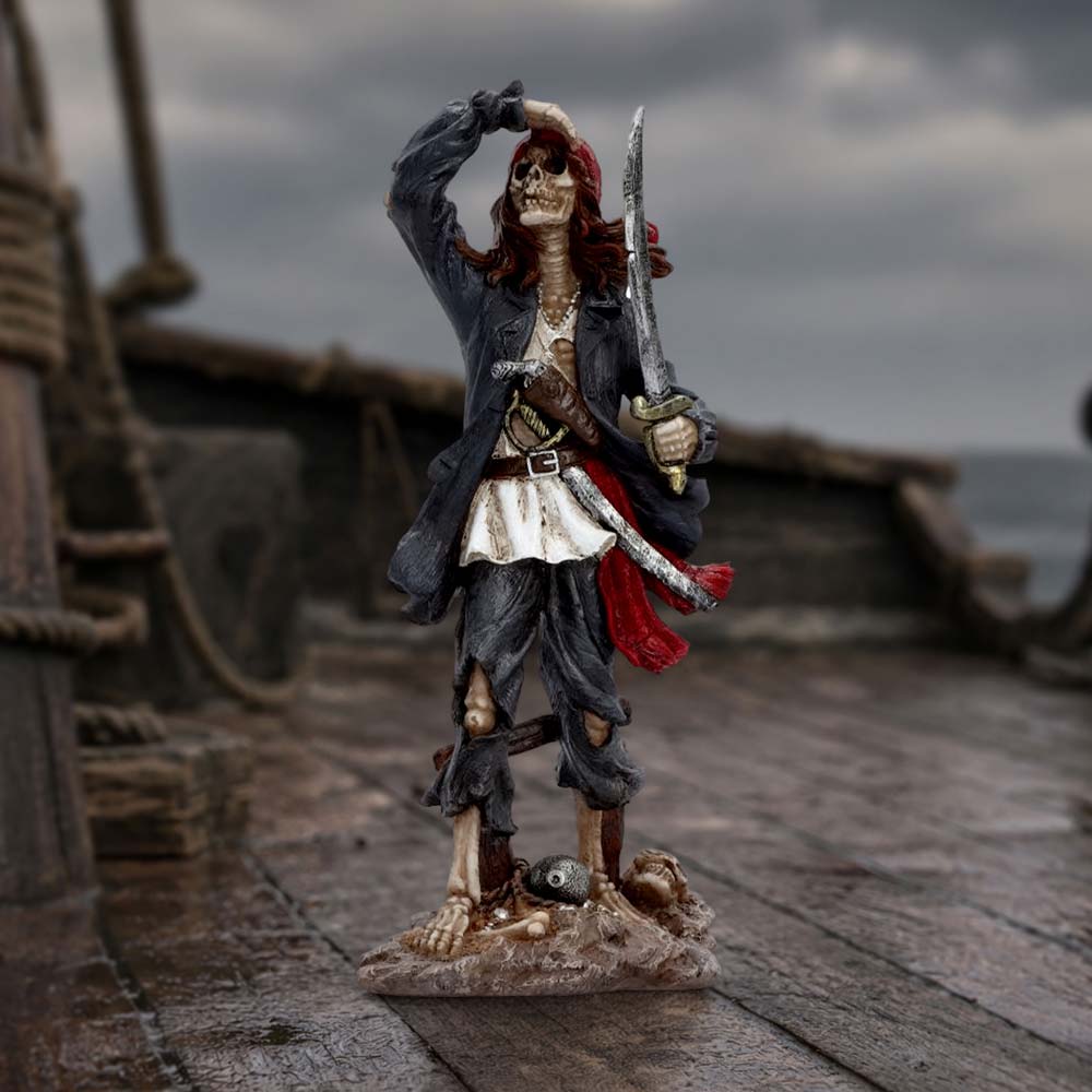 Forsaken Sailor Skeleton Pirate Figurine - red-bandana skeleton sailor in a ship-themed display