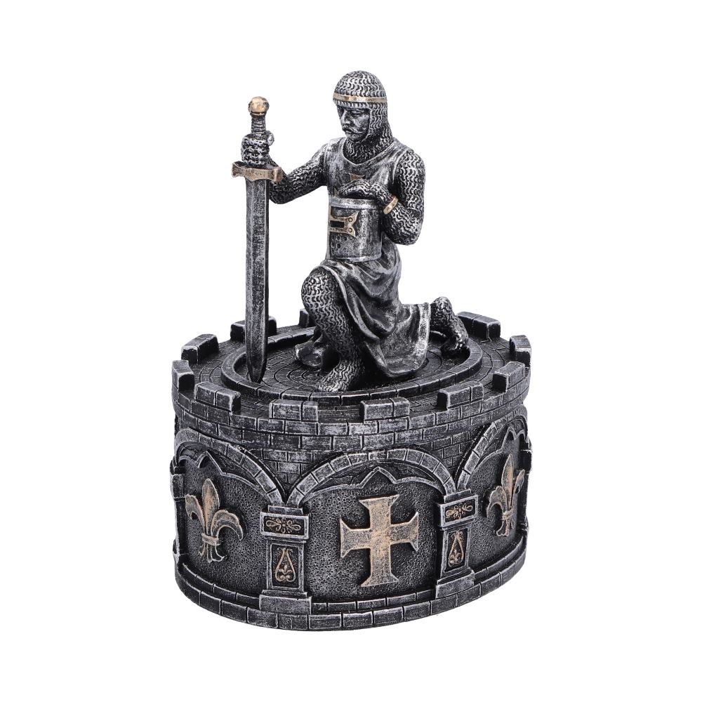 The Pledge Knight Trinket Box - angled sword and armour above the decorated storage wall
