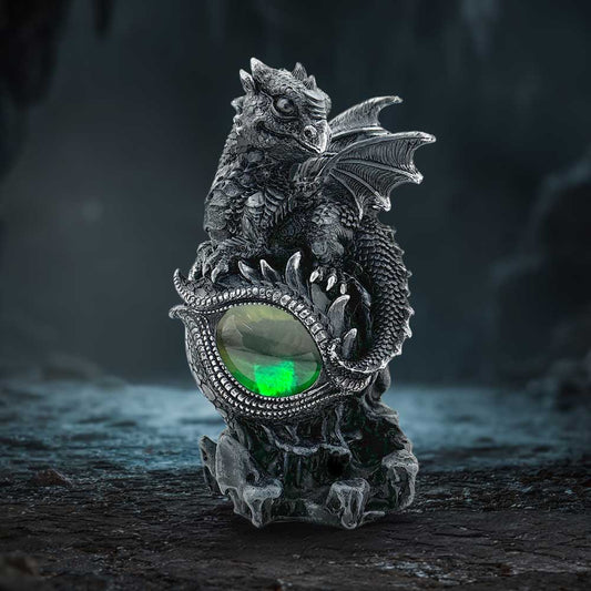 Shadow Sentinel Dragon Eye Ornament - dragon eye ornament displayed in a shadowy gothic setting