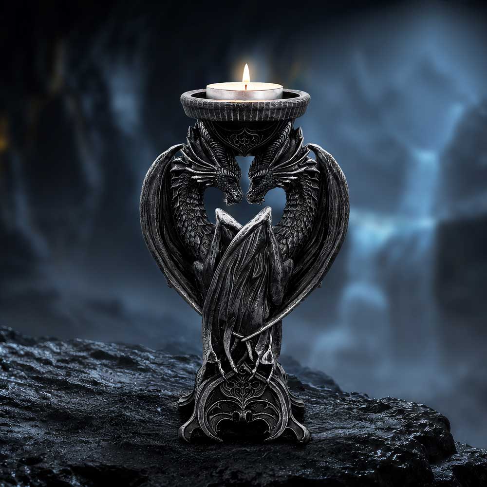 Dark Heart Dragon Candle Holder - Dark Heart holder with a lit candle in a fantasy setting